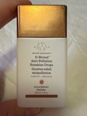 Drunk Elephant D-Bronzi Anti-Pollution Sunshine Drops - White & Gold